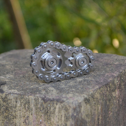 Chain - toothed flywheel finger top