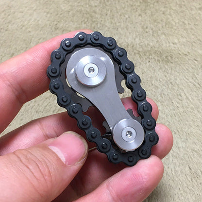 Chain - toothed flywheel finger top